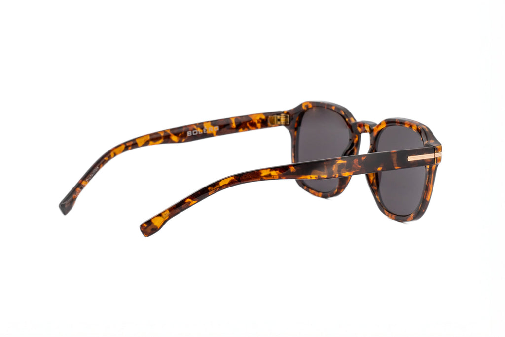 Boléro Quinn — Lunettes de soleil carrées rétro