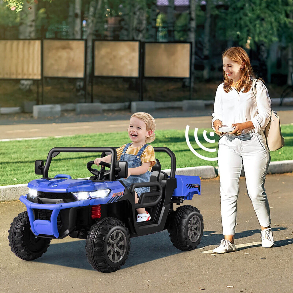Camión volquete eléctrico de 2 plazas para niños con suspensión de muelles, control remoto de 3 velocidades, freno de emergencia y pasamanos, 110 lb, azul