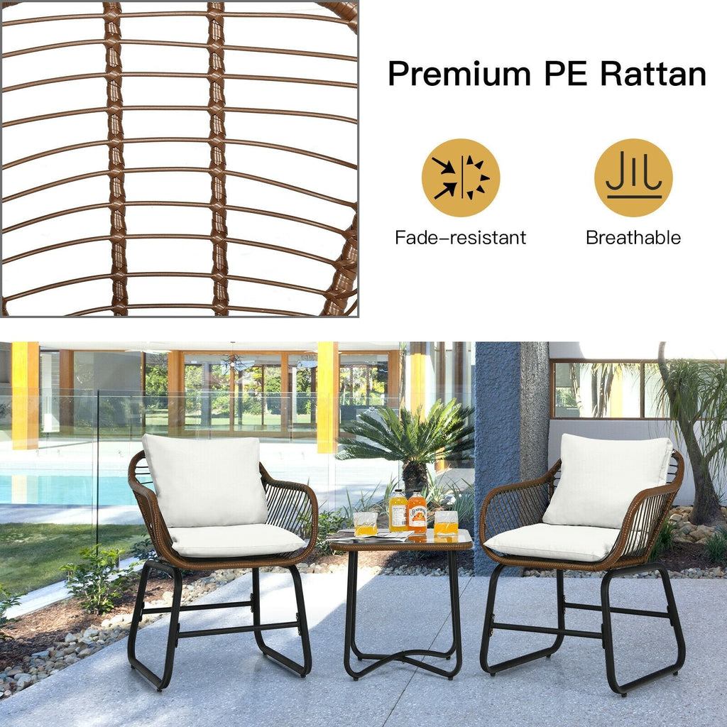 Juego de bistró de ratán para patio de 3 piezas, 2 sillas tipo cesta de tejido abierto con capacidad de 350 lb, cojines color crema y mesa con cubierta de vidrio de 19 pulgadas