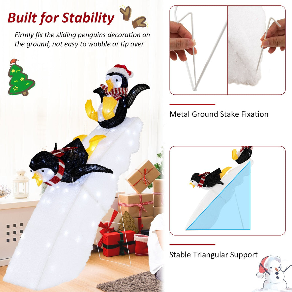Décoration de Noël pingouin patineur avec toboggan enneigé de 1,20 m