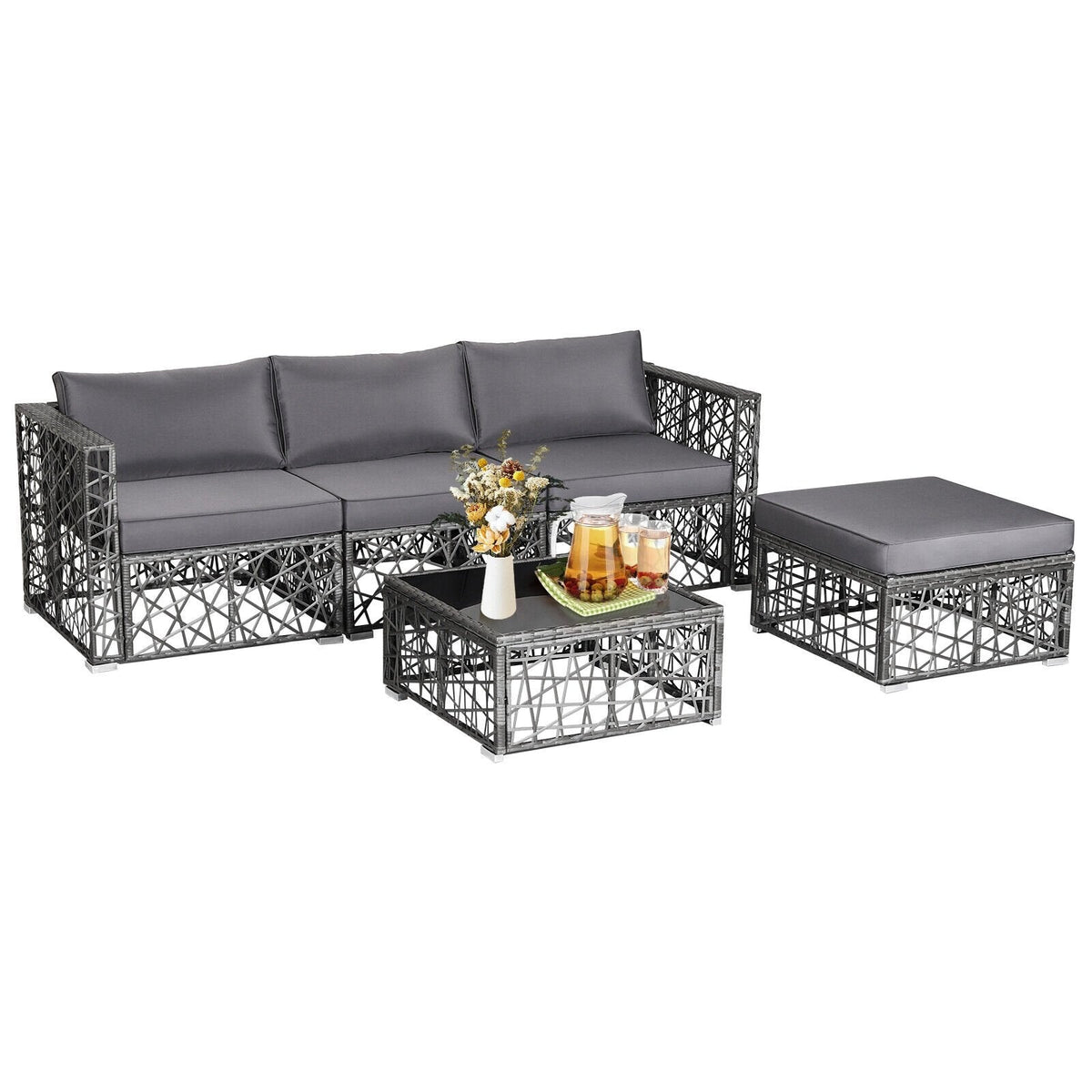 5-teiliges Terrassen-Set aus offen geflochtenem Rattan, 2 Ecksofas, Sitzbank ohne Armlehnen, Hocker und Glastisch, Grau
