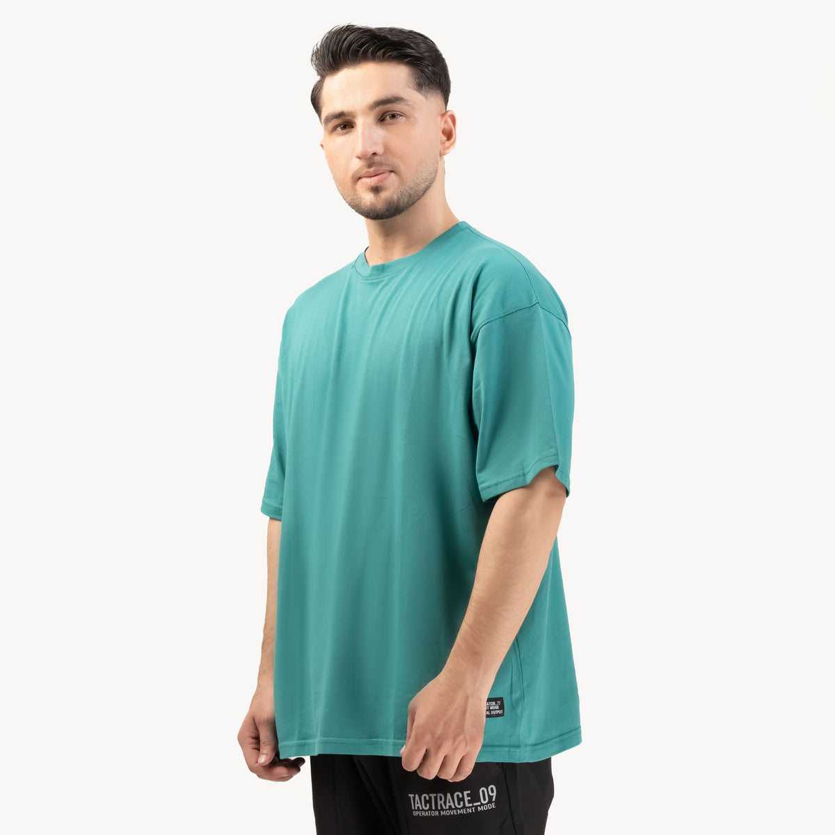 OPERATOR_77 OVERSIZED T-SHIRT — ROUGE GRÜN