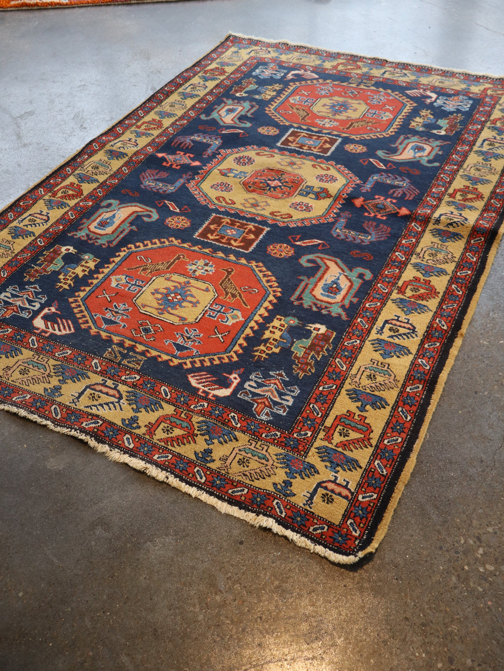Persian Meshkin Rug — Saffron Medallions & Tribal Birds | 4'7" × 6'9"