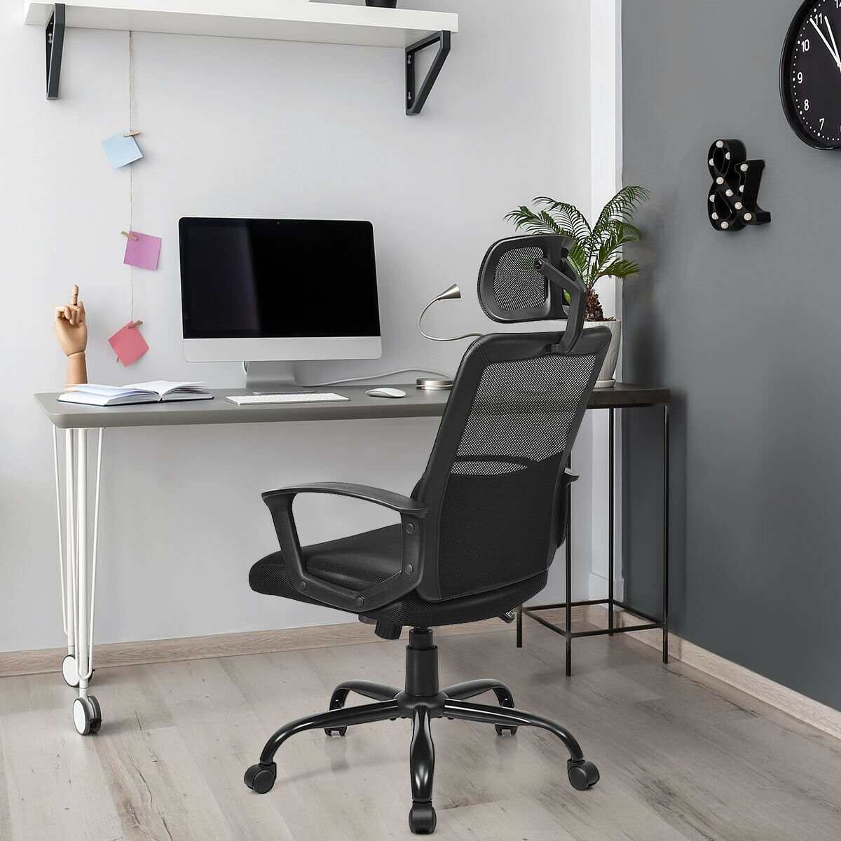 Silla de oficina ergonómica de respaldo alto con malla y base giratoria