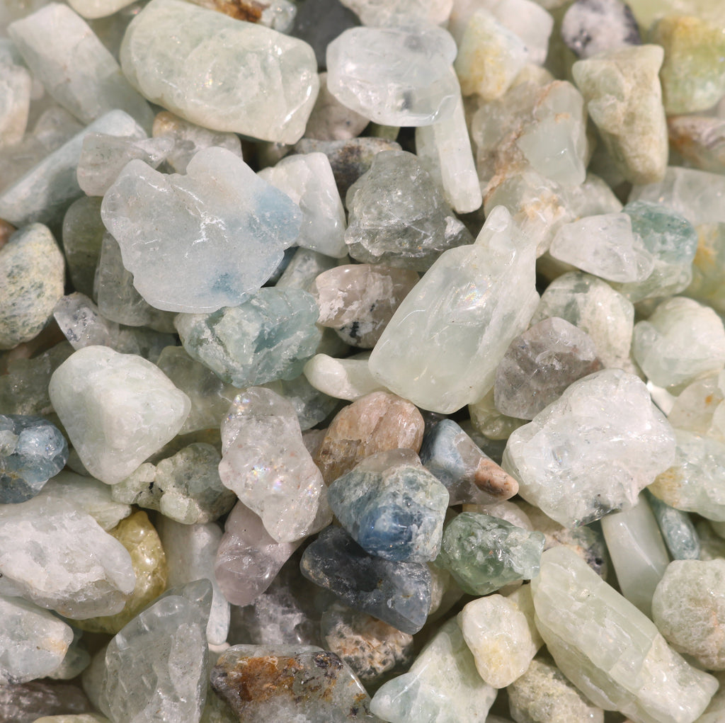 Aquamarin B Trommelsteine – teilpoliert