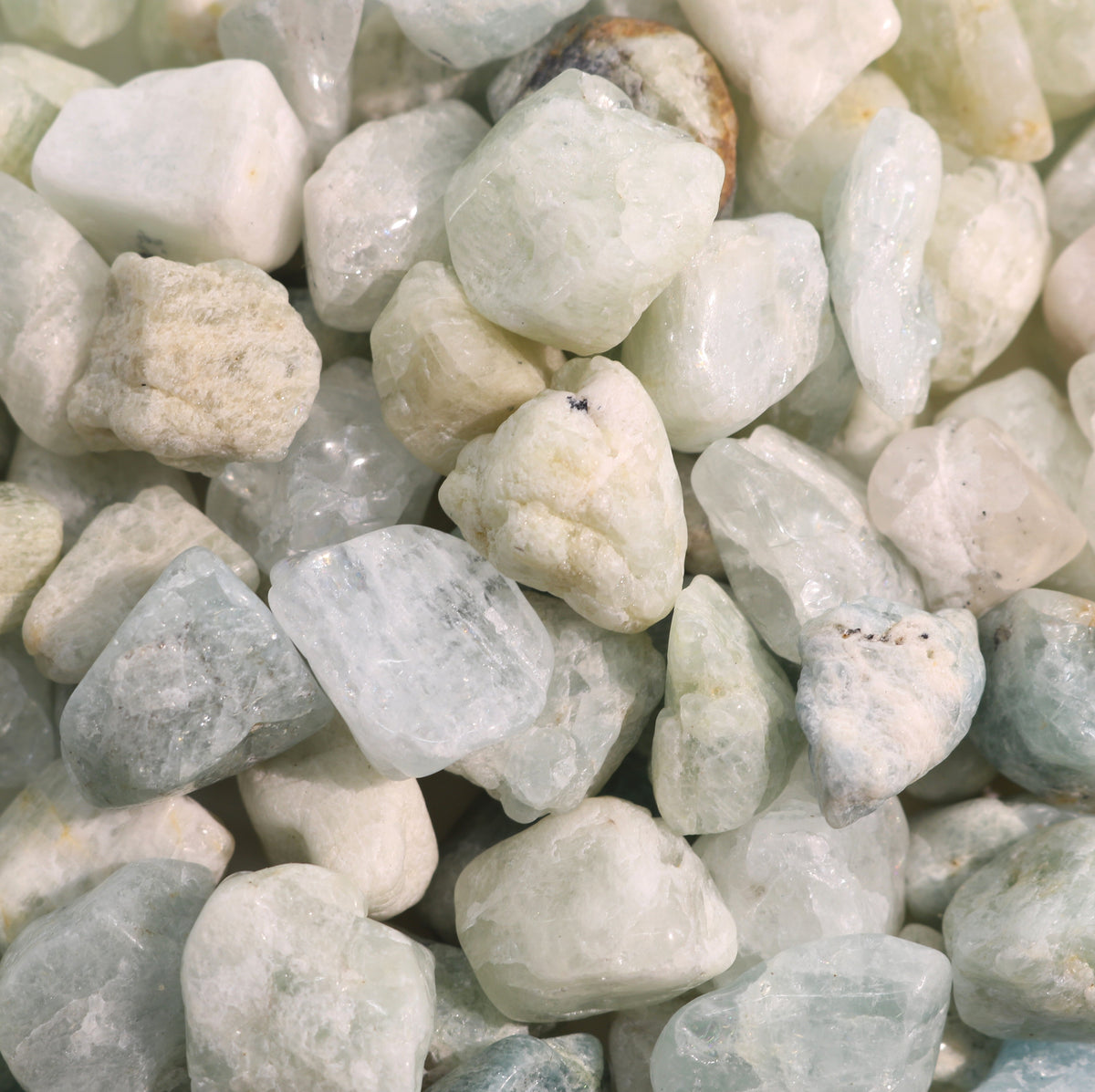Aquamarin B Trommelsteine – teilpoliert