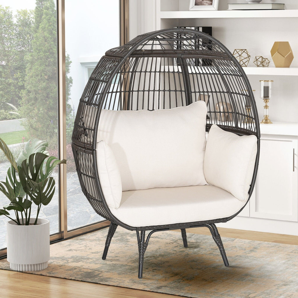 Übergroßer Lounge-Eierstuhl aus Korbgeflecht mit 4 cremeweißen Kissen, braunes Rattan