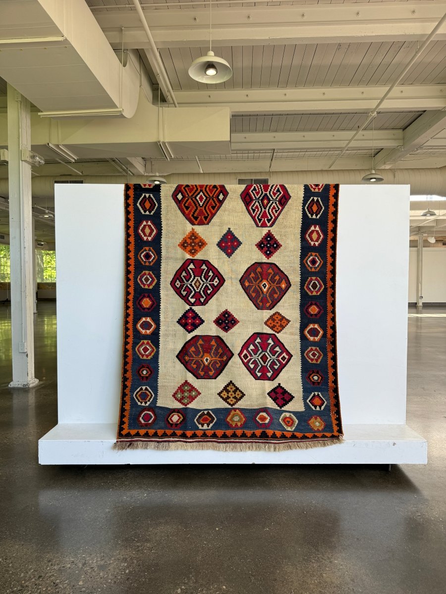 Qashqai Kilim — Jewel-Tone Scorpion Motifs on Ivory | 4'11" × 7'8"