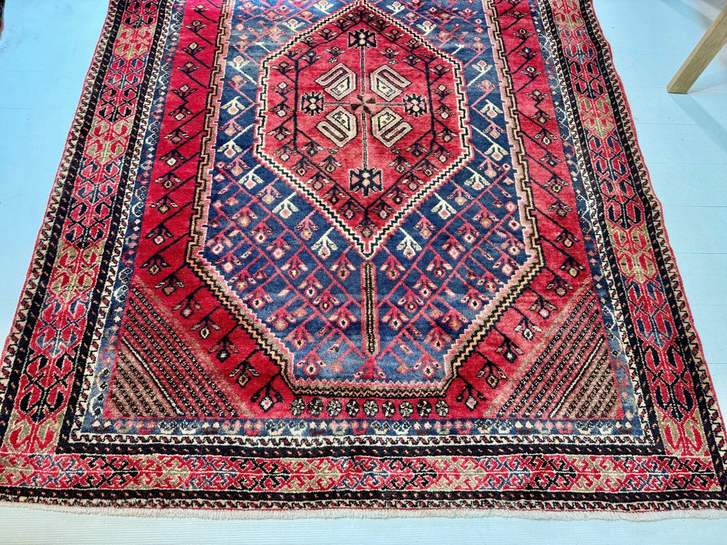 Persian Shahr-e Babak Rug — Ruby & Indigo Geometric Medallion | 5'5" × 7'3"