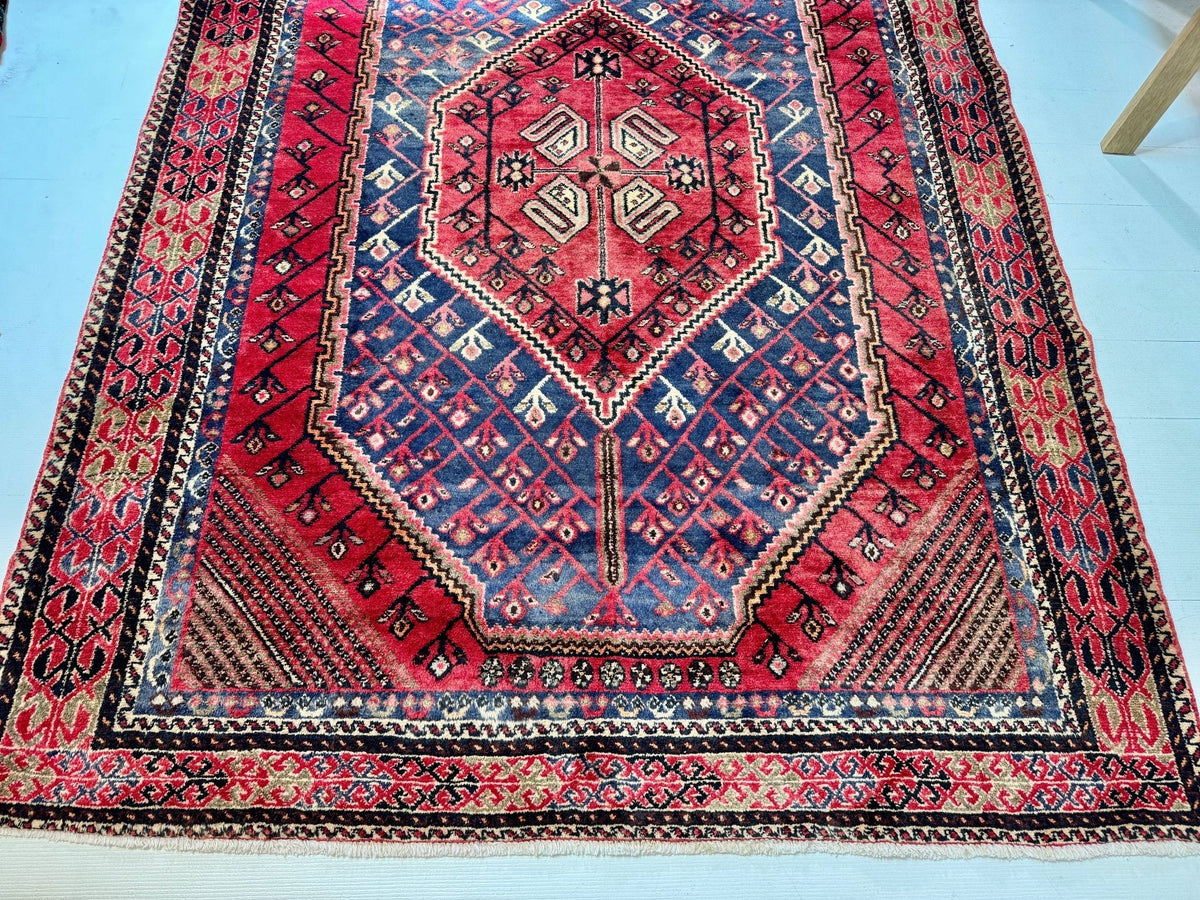 Persian Shahr-e Babak Rug — Ruby & Indigo Geometric Medallion | 5'5" × 7'3"