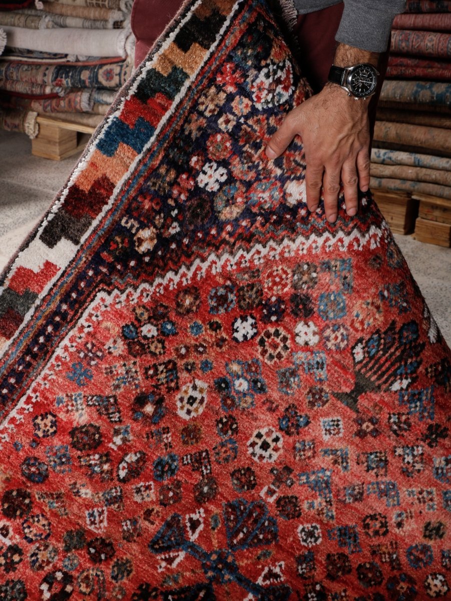 Persian Shiraz Rug — Coral Rosettes & Checkered Border | 3'6" × 5'1"