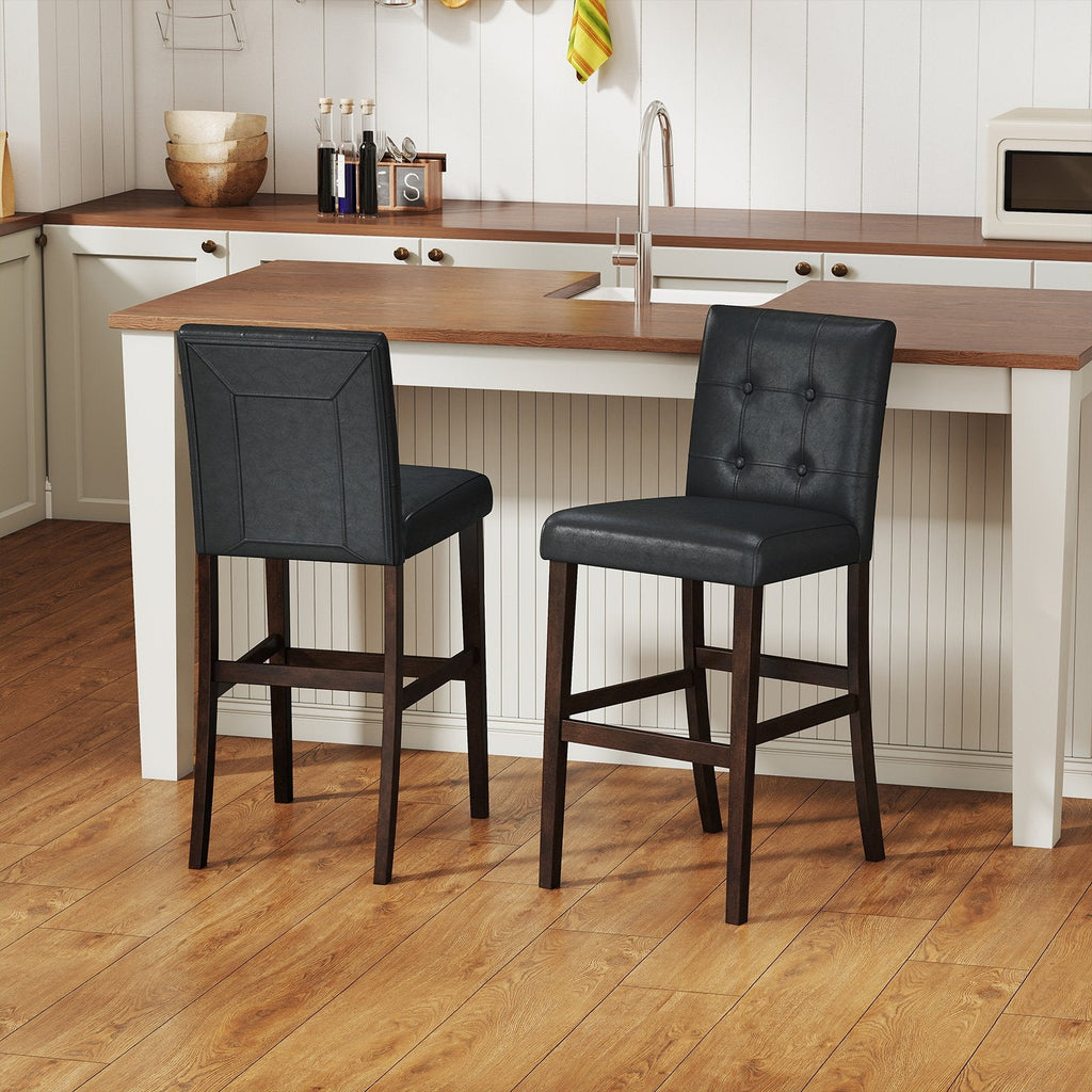 Juego de 2 taburetes de mostrador tapizados en PVC negro con patas de madera maciza, asiento de 26 pulgadas