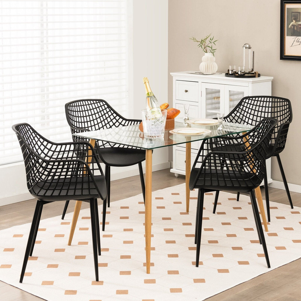 Juego de 4 sillas de comedor con respaldo hueco y asiento curvo, plástico negro y patas de metal