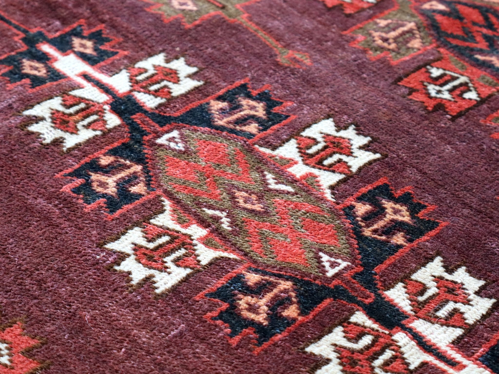 Turkmen Yomut Rug — Wine Red & Ivory Guls | 6'10" × 10'7"