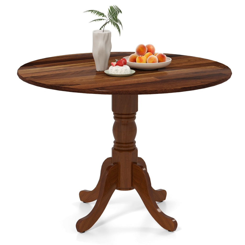 Mesa de comedor de madera con tablero redondo y patas caballete curvadas - Nogal